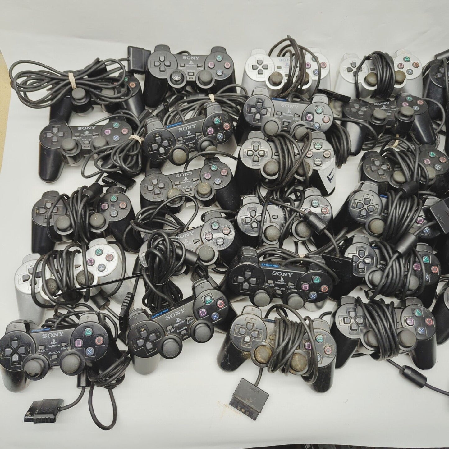 Faulty - 38x Genuine Playstation 2 ps2 Controllers Black Silver Job lot