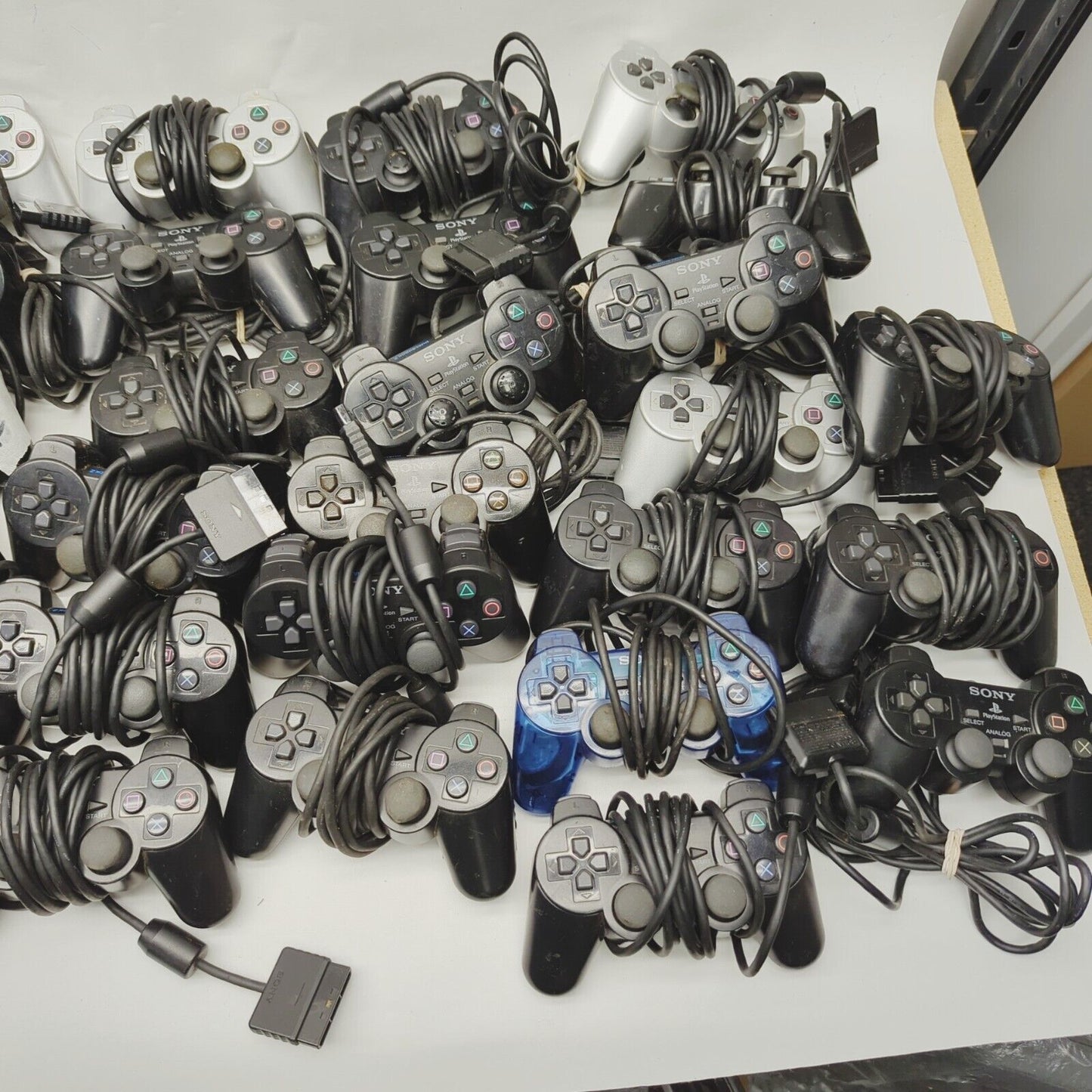 Faulty - 38x Genuine Playstation 2 ps2 Controllers Black Silver Job lot